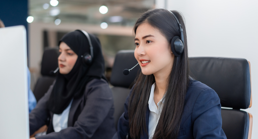 People attending an online call with their headsets on.